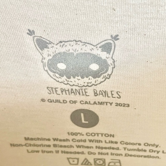 NEW Cowboy Mothman Guild of Calamity Stephanie Bayles Cream T Shirt Adult Large - Picture 6 of 6